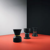 Pa.He.Ko Side Table - black on a red floor