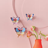 Plum Fringe Butterflies Wall Art, Set of 3, styled in an interior