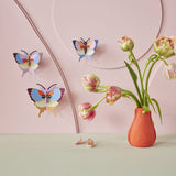 Plum Fringe Butterflies Wall Art, Set of 3, styled in an interior
