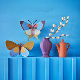 Plum Fringe Butterfly Wall Art, styled in an interior