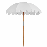 White round beach umbrella with a scalloped valance edge and a pointed timber pole — The Weekend Umbrella 170 cm Diameter by Basil Bangs