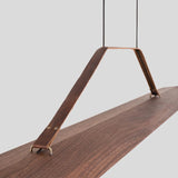 Penna Linear Pendant by Cerno, walnut body with brown leather strap detail