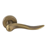 Peter Door Lever in Antique Brass by Colombo Design