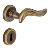 Piuma Door Lever in Bronze angled view by Colombo Design