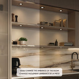 Push Puck Recessed Puck Light by Dals installed under a cabinet