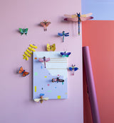 Ruby Dragonfly Wall Art, styled in an interior