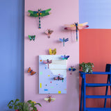 Ruby Dragonfly Wall Art, styled in an interior
