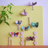 Ruby Dragonfly Wall Art, styled in an interior