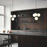 Rock Grey/Opal Miira 4 Pendant Light by Nuura in Kitchen