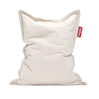 Large cream corduroy bean bag lounger with soft ribbed texture and a red Fatboy tab — Slim Cord Bean Bag by Fatboy