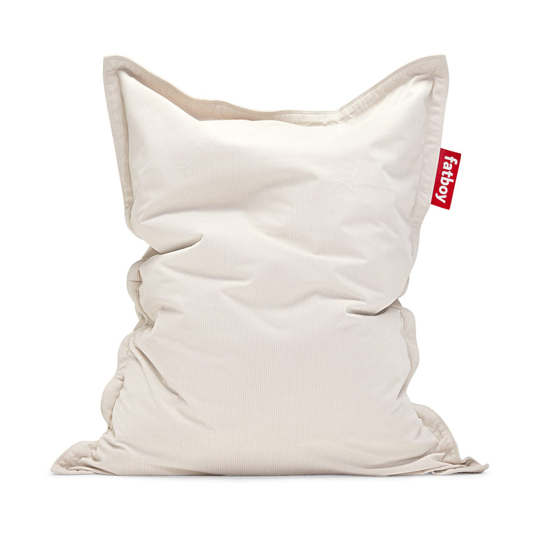 Large cream corduroy bean bag lounger with soft ribbed texture and a red Fatboy tab — Slim Cord Bean Bag by Fatboy