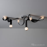 SNAPS LED Linear Suspension, shown in Sterling, Black Leather & Alabaster, by Hubbardton Forge