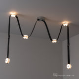 SNAPS LED Linear Suspension, shown in Sterling, Black Leather & Alabaster, by Hubbardton Forge