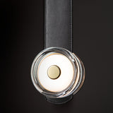 SNAPS LED Linear Suspension detail in Modern Brass, Black Leather & Pressed Glass, by Hubbardton Forge