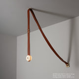 SNAPS Single LED Pendant, shown in Modern Brass, Chestnut Leather & Alabaster, by Hubbardton Forge