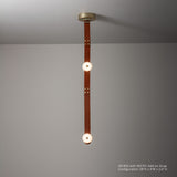 SNAPS Single LED Pendant, shown in Modern Brass, Chestnut Leather & Alabaster, by Hubbardton Forge