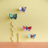 Speckled Copper Butterfly Wall Art, styled in an interior