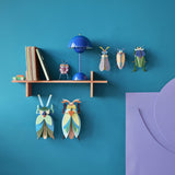 Striped Wing Beetle Wall Art, styled in an interior