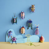 Striped Wing Beetle Wall Art, styled in an interior