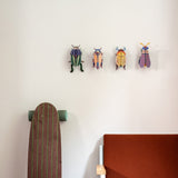 Striped Wing Beetle Wall Art, styled in an interior