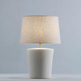 Santos Table Lamp by Geo Contemporary in White, lit