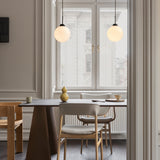 Satin Black/Opal Large Apiales Single Pendant Light by Nuura in Dining Area
