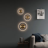 Saturn Round Wall Sconce By Page One Medium Inside View