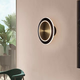 Saturn Round Wall Sconce By Page One Medium Lifestyle View