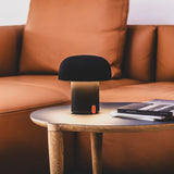 Sensa Battery Table Lamp - Anthracite, on a side table
