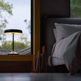 Shiny Black Mr DJ Table Lamp by Seed Design in Bedroom