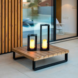 Siroco Portable Lantern - Small and Large, on an outdoor bench