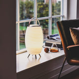 Synergy Battery Wine Cooler Lamp - Small, on a windowsill