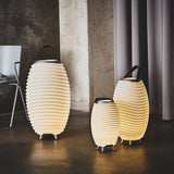 Synergy Battery Wine Cooler Lamp - three sizes, lit in a living room
