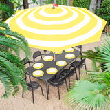 Toní Armchair - Anthracite, around a garden dining table