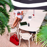 Toní Armchair - Desert, at a garden table