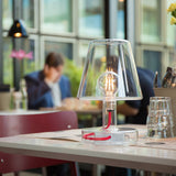Transloetje Table Lamp - Transparent, on a cafe table
