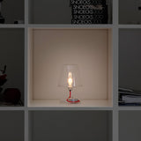 Transloetje Table Lamp - Transparent, in a bookcase