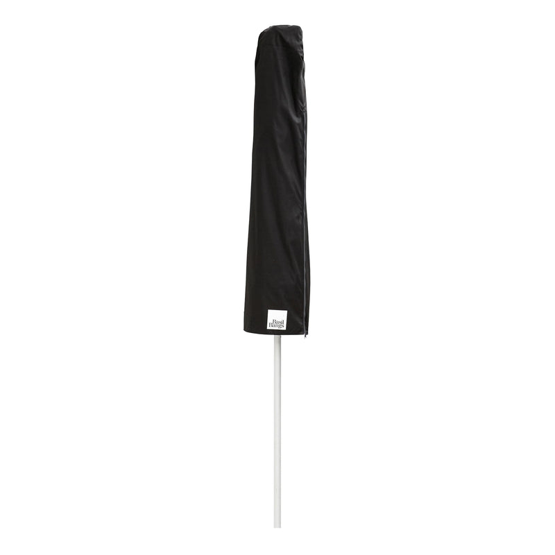 Black zippered umbrella storage cover with a branded label fitted over a white pole — Umbrella Cover by Basil Bangs