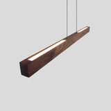 Una Linear Pendant by Cerno, Small in walnut with the optional uplight, view from above