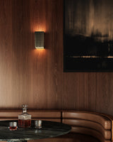 Urban Bronze 9inch Astoria Wall Sconce by Kuzco in Dining Area