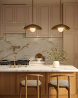 Vintage Brass/Matte Opal Glass 6inch Umbra Pendant by Kuzco Lighting in Kitchen Area