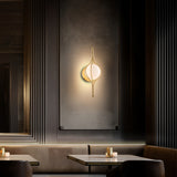Vintage Brass Skyla Adjustable Wall Sconce by Modern Forms in Dining Area
