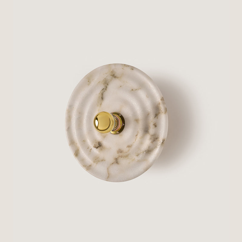 Wave Wall Light by Aromas Del Campo, shiny gold fitting with natural alabaster disc