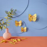 Yellow Butterflies Wall Art, Set of 3, styled in an interior