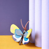 Yellow Monarch Butterfly Wall Art, styled in an interior