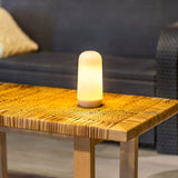 Candy Portable Table Lamp - on an outdoor table