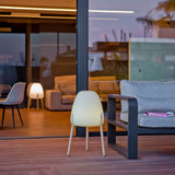 Rocket Floor Lamp - Small, on a terrace at dusk