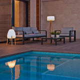 Rocket Floor Lamp - Small, by a pool
