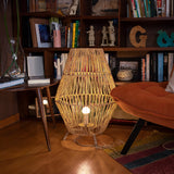 Sisine Floor Lamp - lit in a living room
