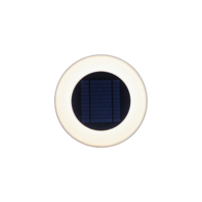 Round wall light with a softly glowing warm white ring framing a central blue solar panel — Wally Battery Wall Lamp by New Garden